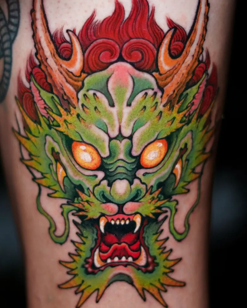 american traditional dragon tattoo