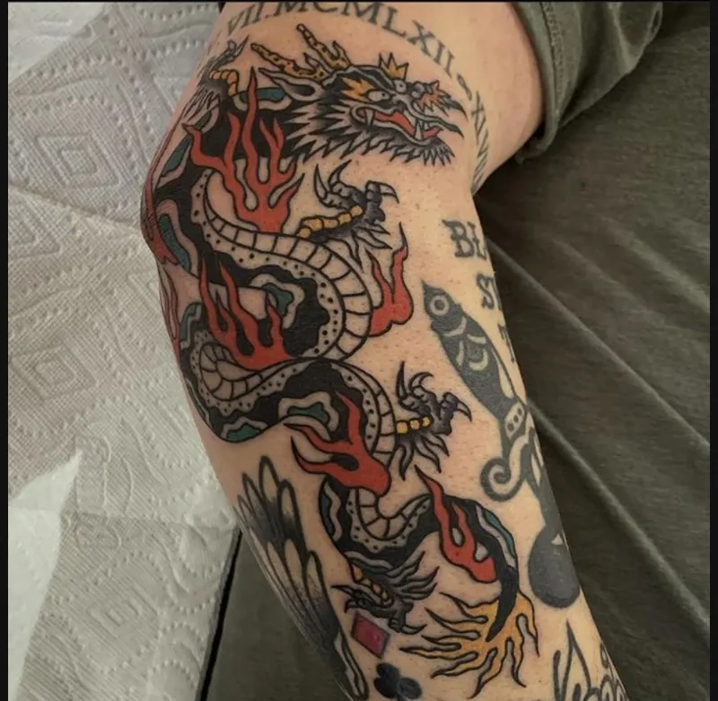 american traditional dragon tattoo