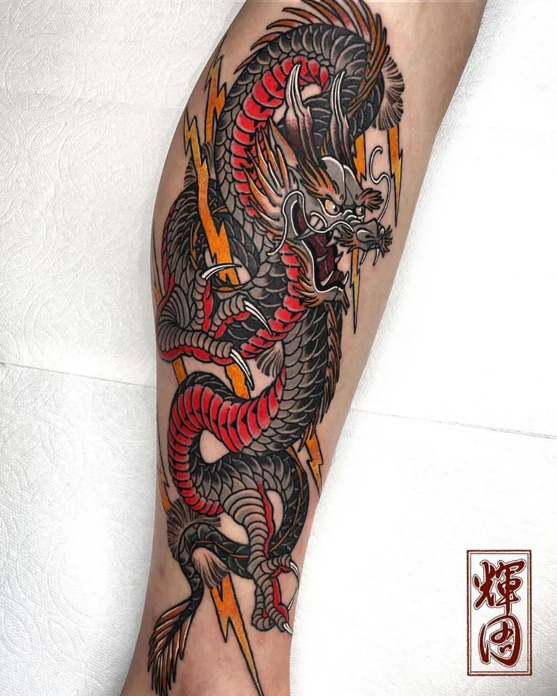 american traditional dragon tattoo