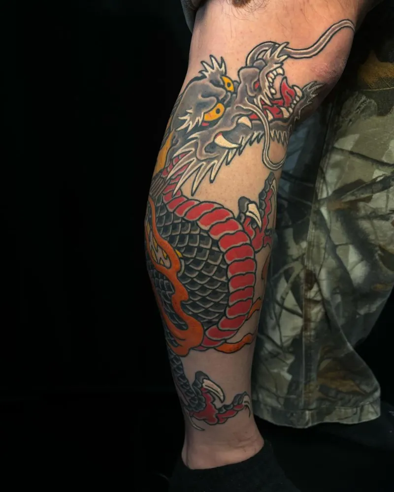 american traditional dragon tattoo